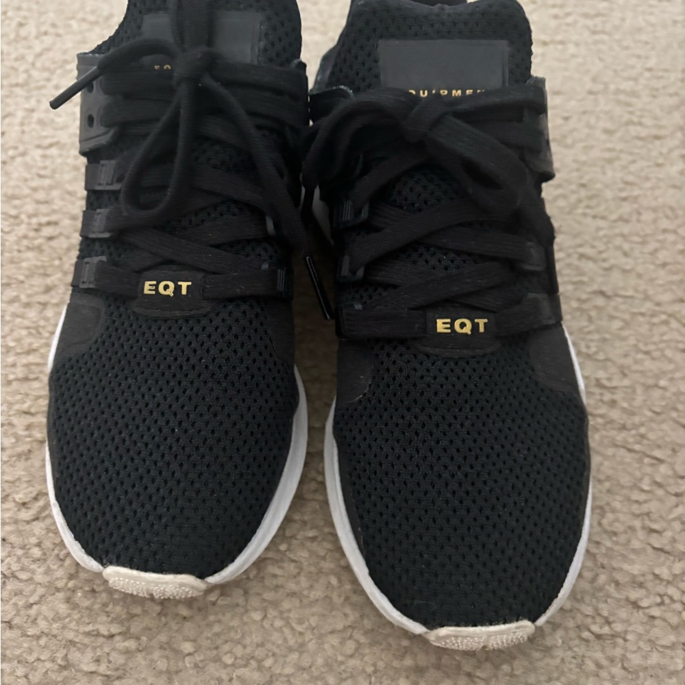 adidas EQT Black Sneakers with White Midsoles and Gold Accents
